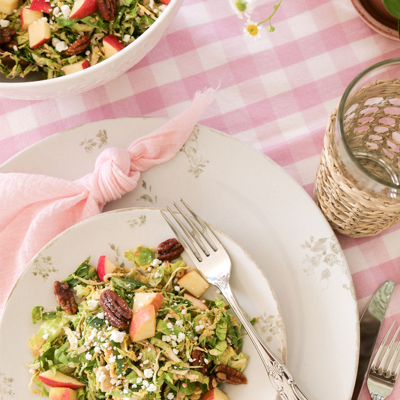 Shaved Brussel Sprout Salad with Apples, Goat Cheese & Candied Pecans