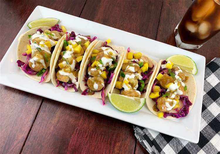 Image of Take a warmed tortilla, place slaw directly on top, then...