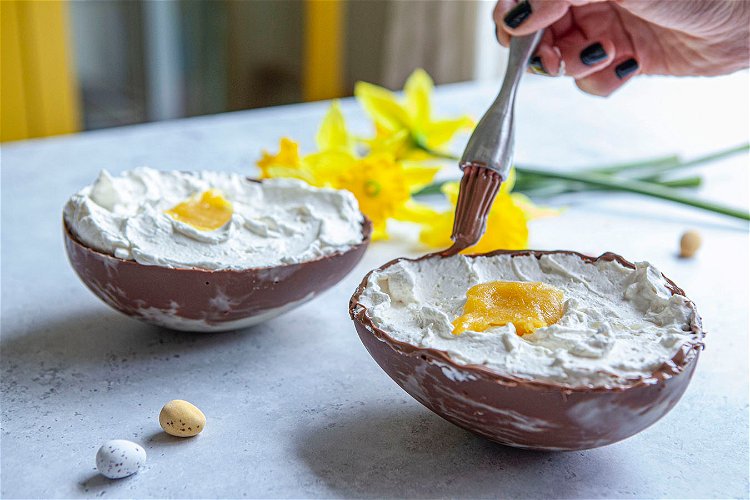 Image of Next, brush on the remaining melted dark chocolate on the...