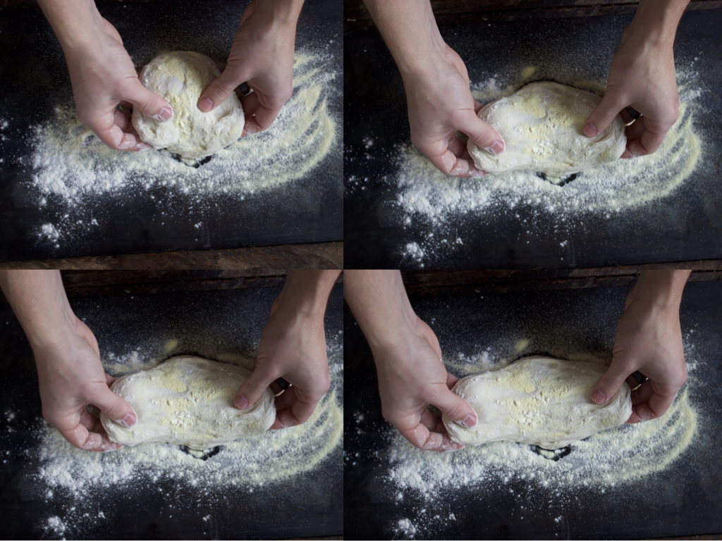 Image of Carefully place a dough on parchment, using both hands, gently...