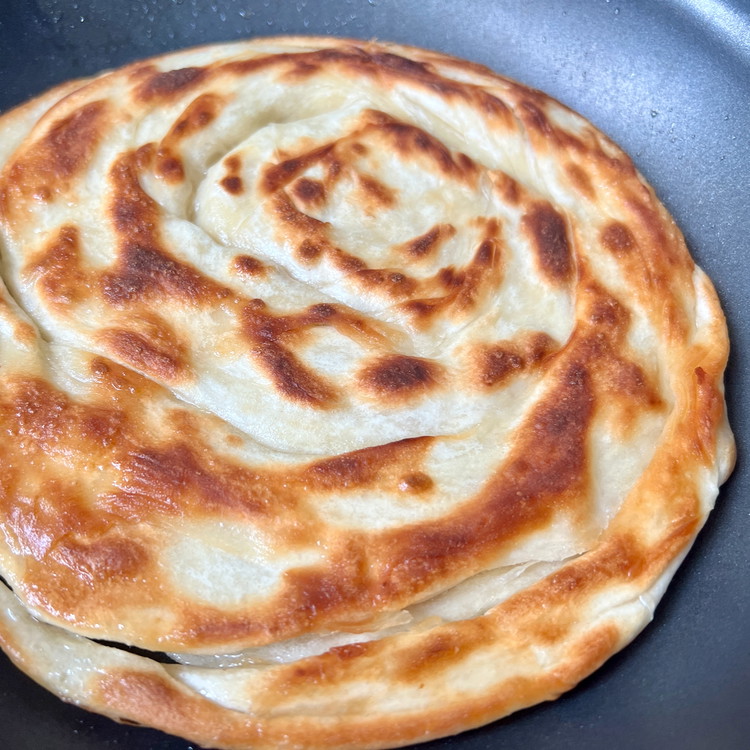 Image of Cook on low/medium heat covered with a lid until golden brown on both sides, turning as needed.
