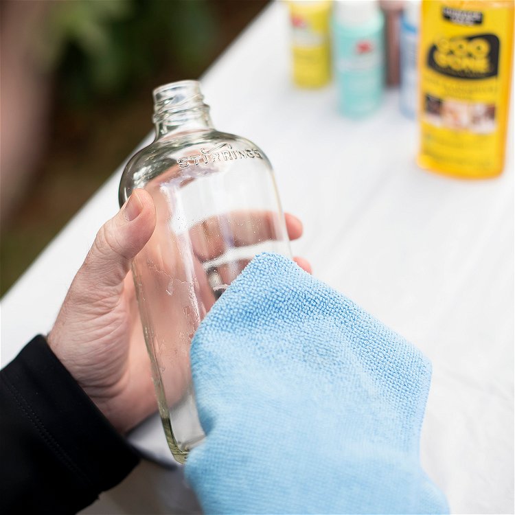 Image of Put Goo Be Gone on a clean rag and wipe...