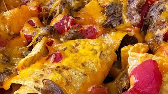Image of Ready to take your nachos to the next level? Add shredded duck!