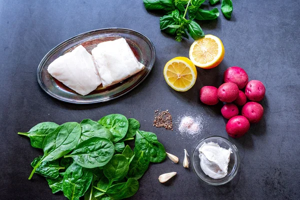 Image of To make the Spinach Basil Sauce: Add the spinach, basil,...