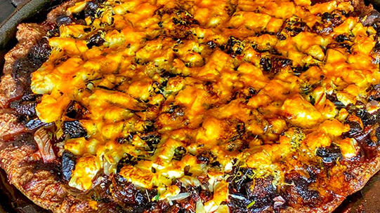 Image of Duck Crust Pizza with Dried Fruit and Feta Cheese