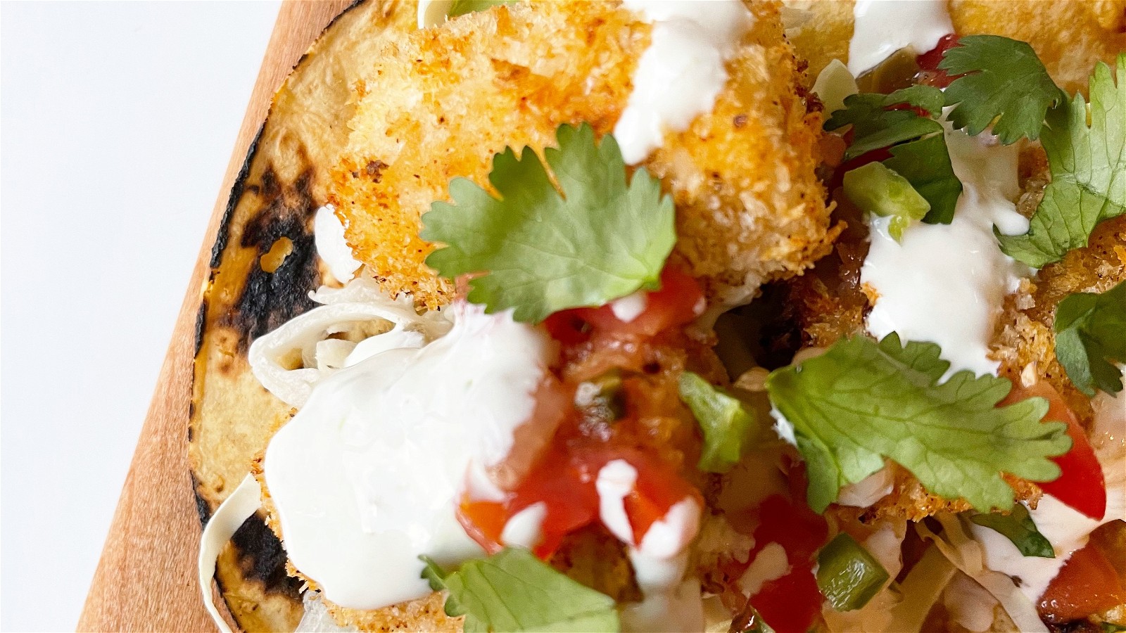 Image of Air-Fried Fish Tacos with Creamy Cilantro Lime Sauce