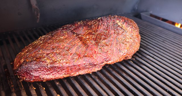 Image of Smoke the brisket at 275°F until the outside starts to...