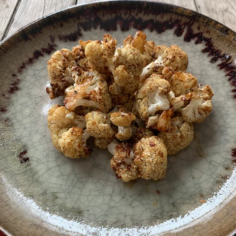 Image of Roasted and Glazed with Stacey Hawkins Balsamic & Dijon  Ingr: (4 tsp Stacey Hawkins Luscious Lemon Oil, 1 T Stacey Hawkins Balsamic Mosto Cotto and 1/2 tsp Dijon mustard, whisked)  Counts: 1/2 C cauli = 1 green, 1 healthy fat & 2...