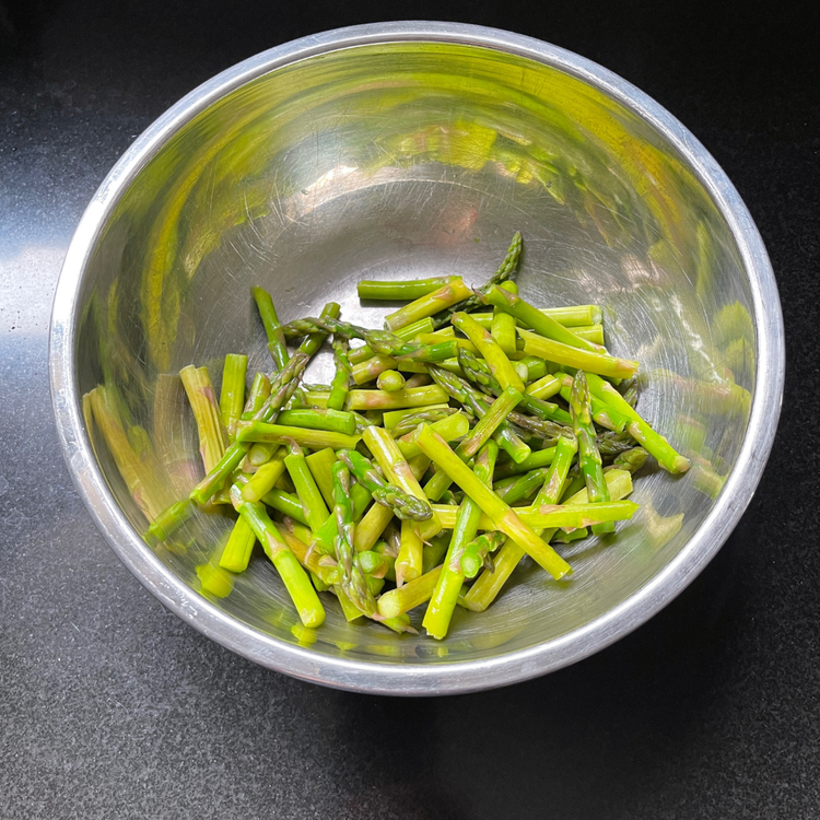 Image of Remove the woody ends from the asparagus.