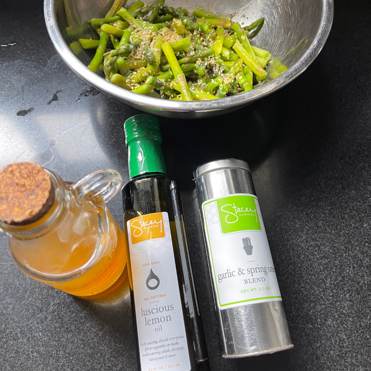 Image of When asparagus is finished cooking, rinse in icy cold water to stop the cooking. Shake off excess water and add the asparagus to the bowl with the vinaigrette.