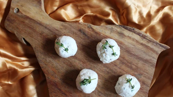 Image of Argan Oil Goat Cheese Balls with Thyme, Lemon Zest, and Black Pepper