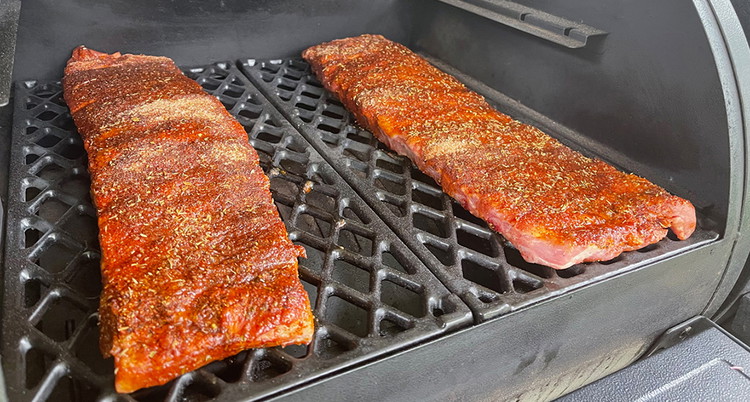 Image of Preheat your smoker to 225-250. Once the temperature is stable and the smoke is clean, place the ribs bone side down on the smoker and cook for approximately 3 hours. I do not touch the ribs during this time -...