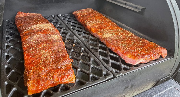 Image of Place the ribs bone side down on the smoker and...