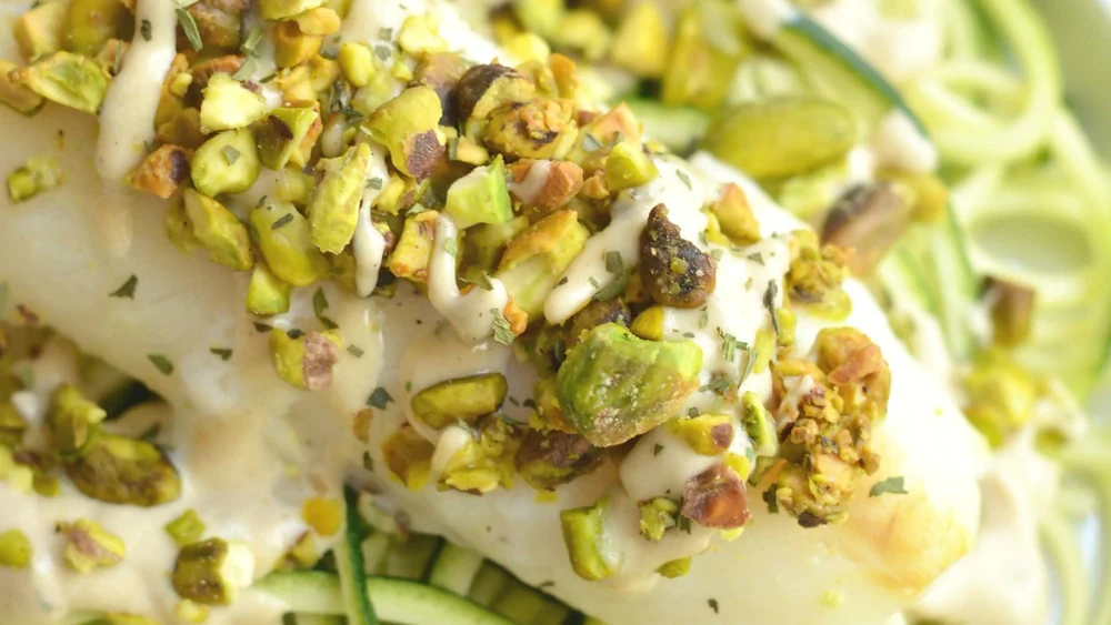 Image of Pistachio Baked Cod with Tahini Zucchini Noodles
