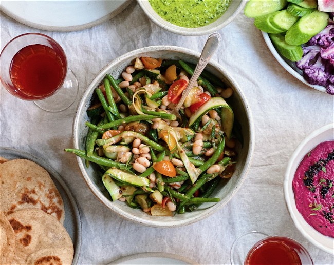 Image of Two Bean Salad with Summer Squash, Herbs & Roasted Tomato Vinaigrette