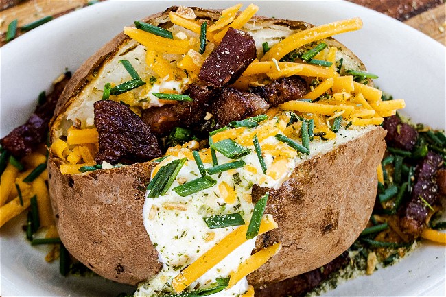 Image of Fully-Loaded Baked Potato with Onion Butter