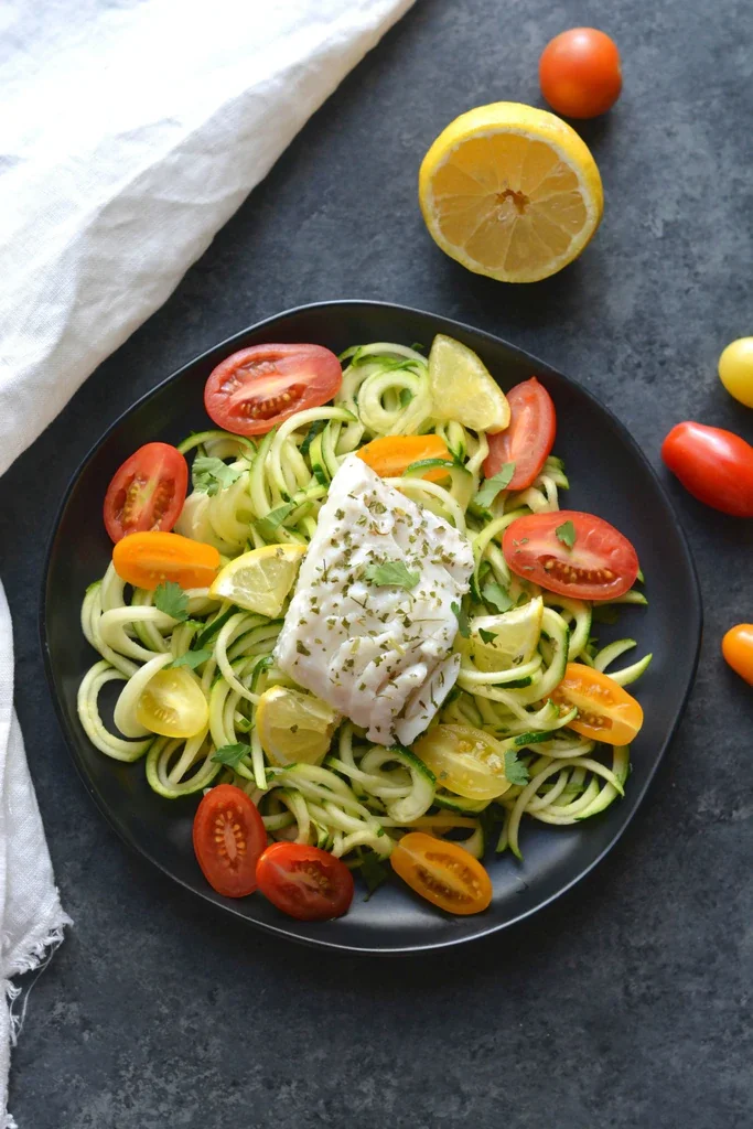Image of Serve the haddock over cooked zucchini noodles with sliced grape...