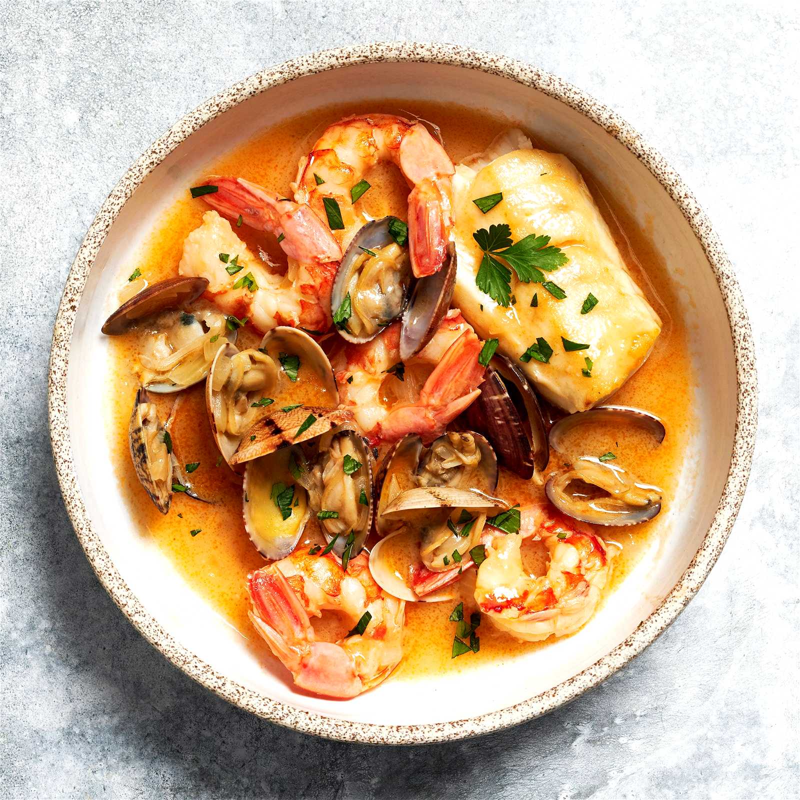 Image of Portuguese-Style Hake with Clams and Shrimp