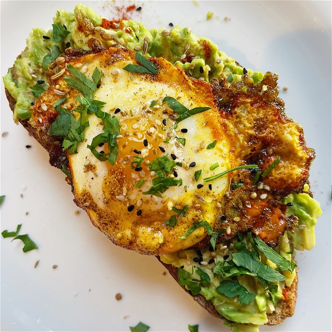 Image of Everything Indian Avocado Toast with Turmeric Chili Egg