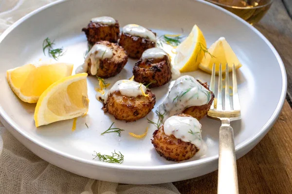 Image of While the scallops cook, add the sour cream, Dijon mustard,...
