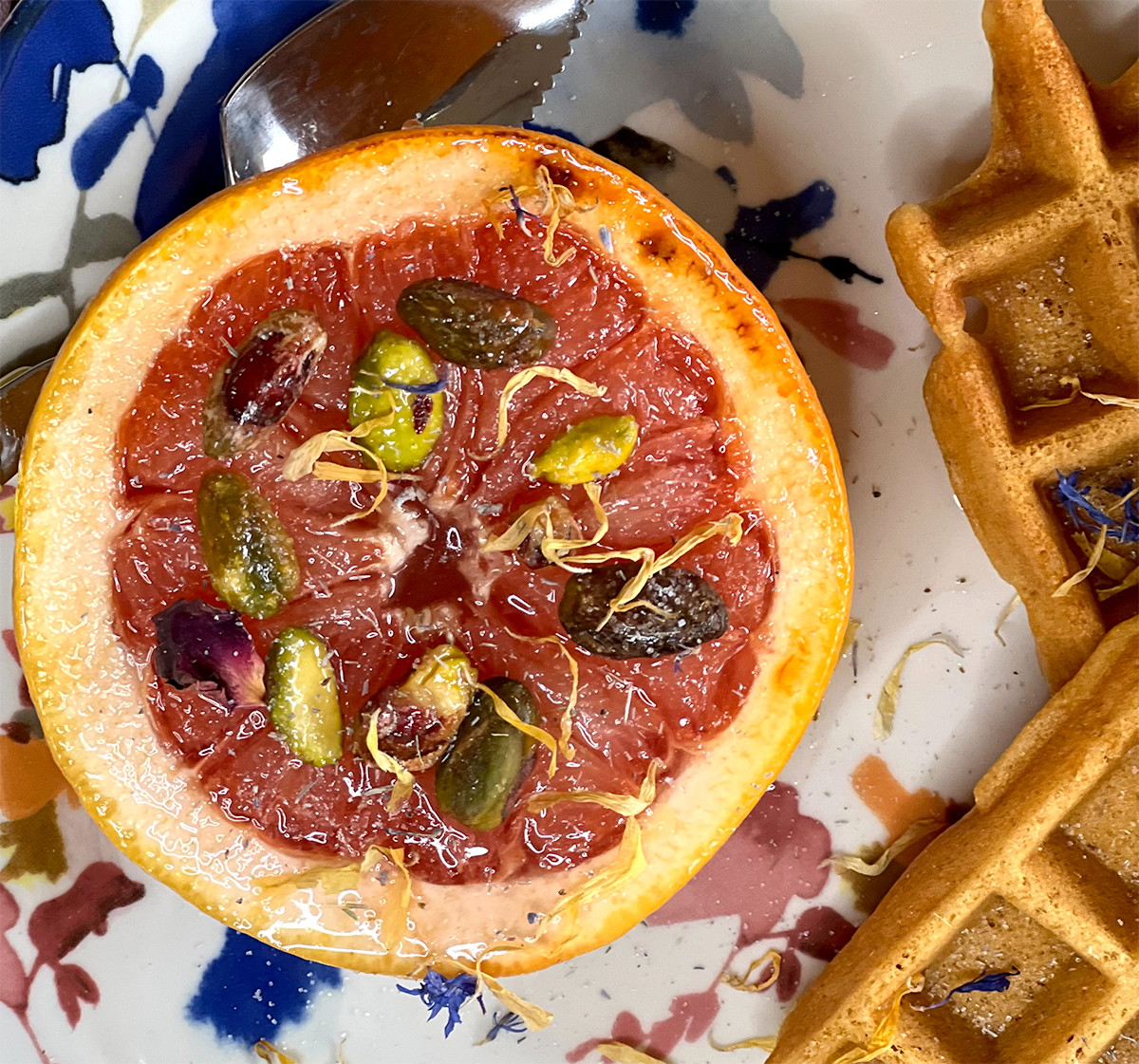 Broiled Grapefruit with Honey, Pistachios, and Dried Flower Petals