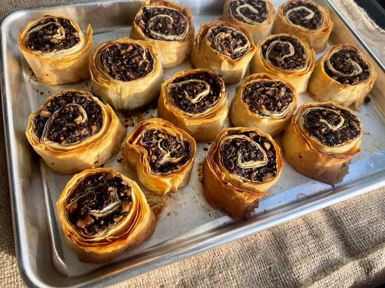 Image of Bake in the oven until the rolls are crispy and the dough is cooked through, about 30 minutes, rotating the tray halfway.