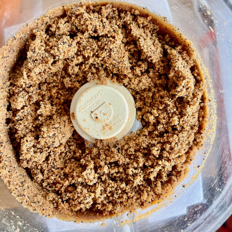 Image of Pulse the graham
crackers with the salt and Coquelicot in your food processor, add melted
butter, and pulse again until combined. The mixture will be like wet sand.