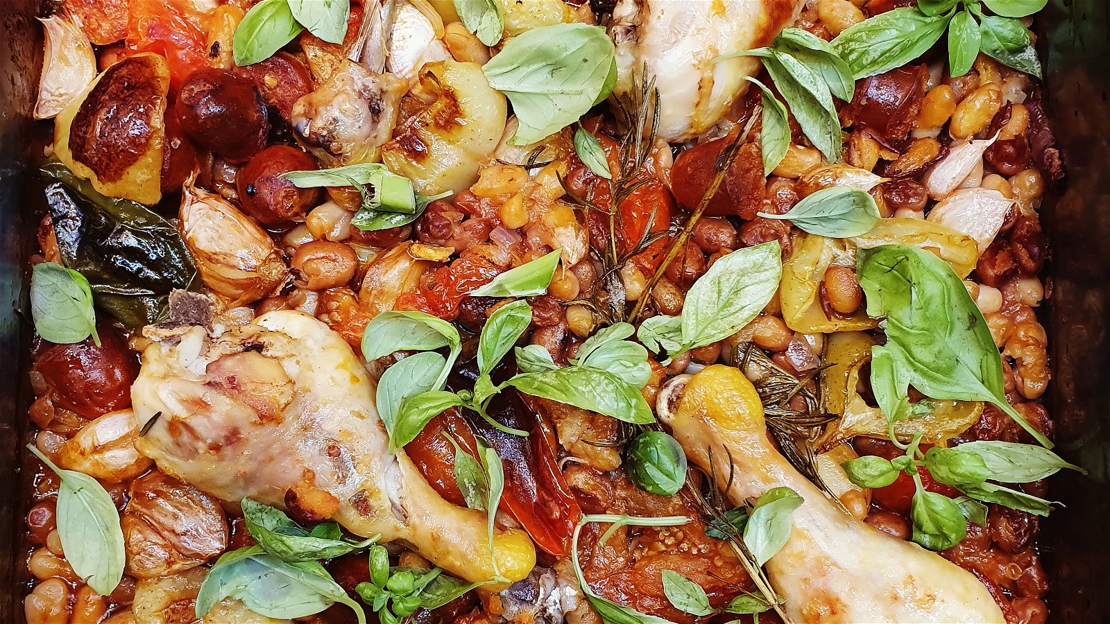 Image of Crisp chicken legs with sweet tomatoes and cannellini beans