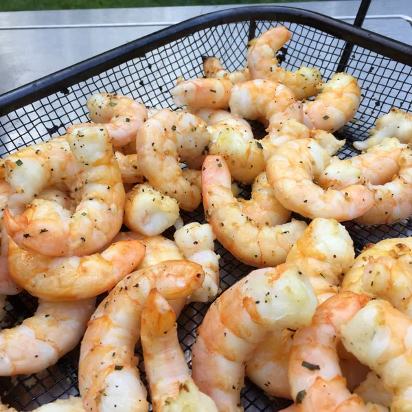 Image of Cook for 15-20 minutes, tossing occasionally with tongs. You'll know they're thoroughly cooked when they are dark pink and opaque. 