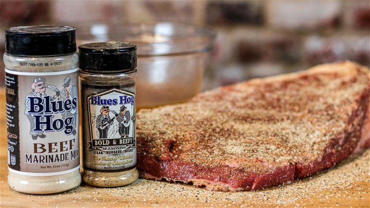 Image of Bring brisket to room temperature and coat generously with Bold...