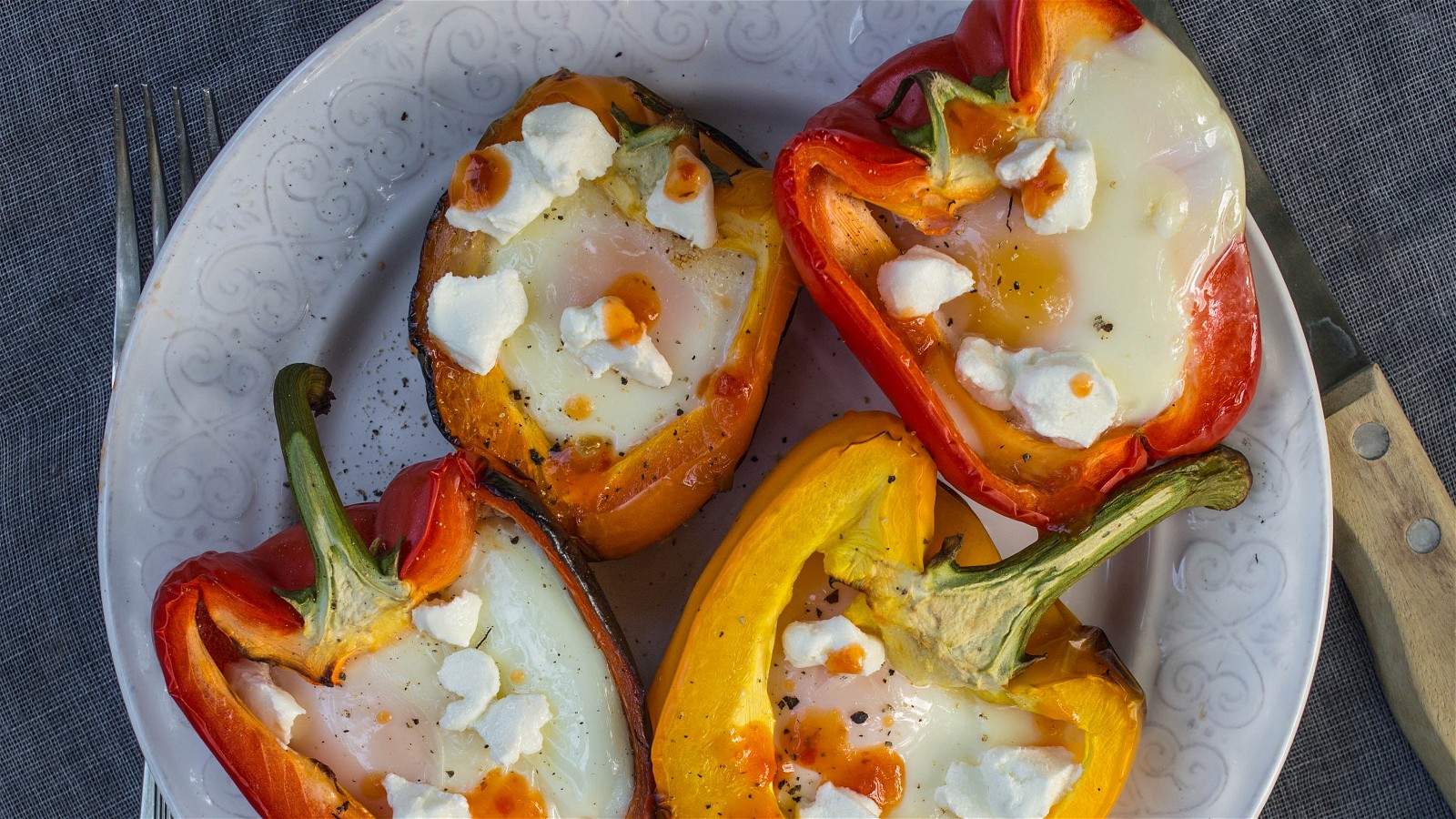 Image of Grilled Bell Peppers Recipe with Baked Egg, Goat Cheese, and Hot Sauce
