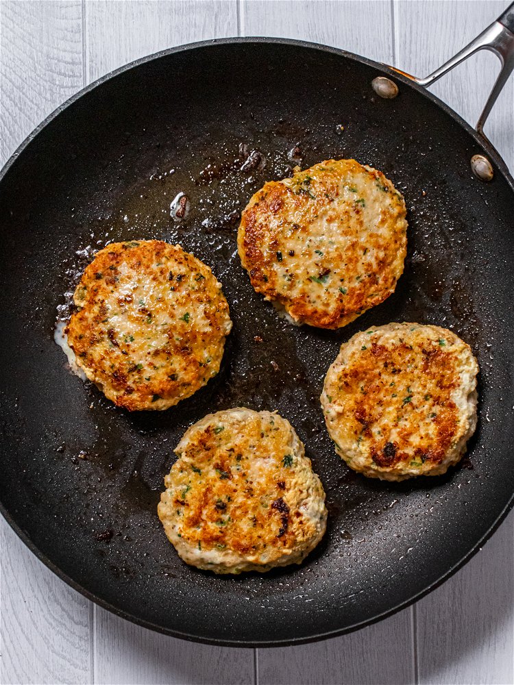 Image of Place burger patties on hot skillet and cook for 3-4...