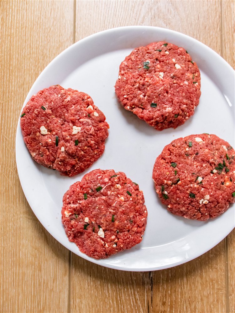 Image of Form beef mixture into 4 large burger patties.
