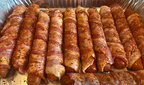 Image of Once all the hotdogs are wrapped Season the bacon with Infidel...