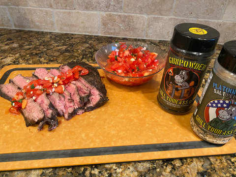 Image of Top the Flank steak slices with the bruschetta mixture and...