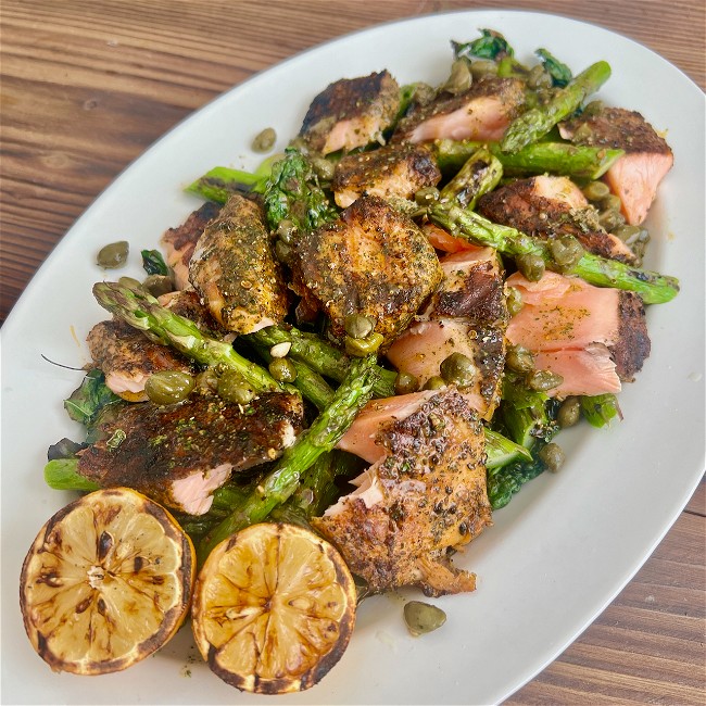 Image of Salmon, Kale, and Asparagus Salad with Grilled Lemon and Caper Vinaigrette