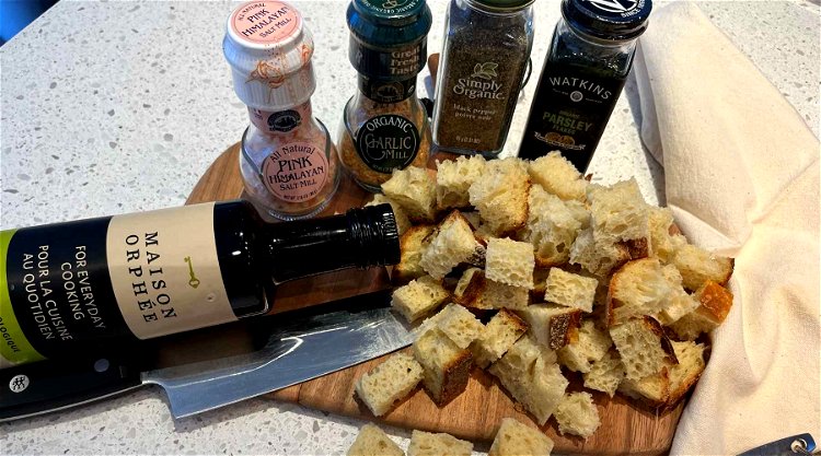 Image of Cut the bread into ½ inch cubes or rip into...