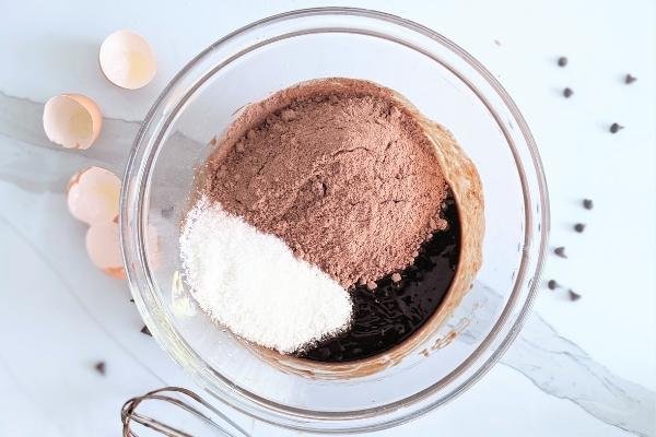 Image of Add the chocolate cupcake mix and coconut, stir until all combined.