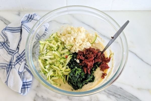 Image of Then add: grated zucchini, spinach, feta, tasty cheese, sun dried...