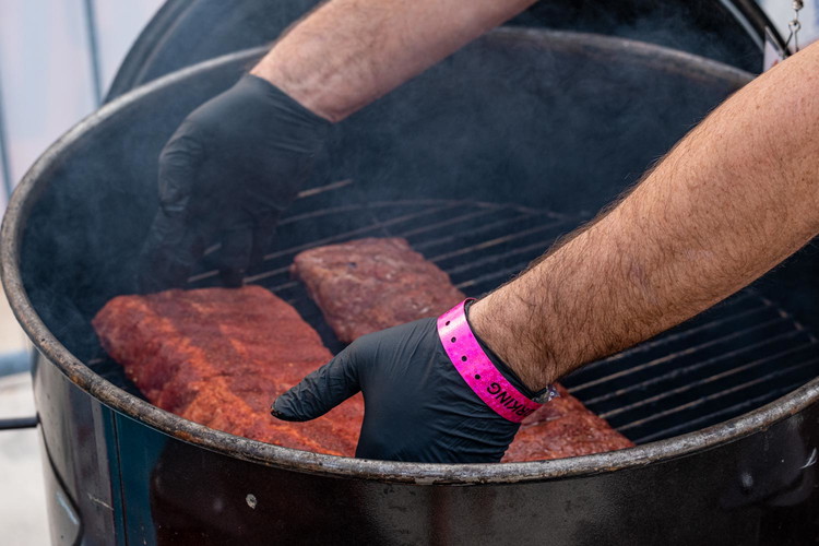 Image of Place on a heated grill and cook until the ribs reach an internal temperature of 160ºF. 