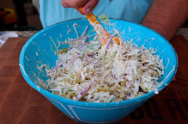 Image of Combine the shredded Cole slaw, red onion, pepperoncini, Mayo, red...