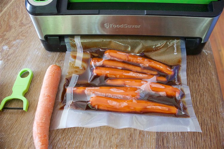 Image of Vacuum seal the carrots in the liquid you mixed before...