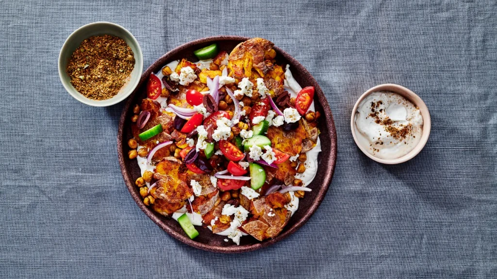 Image of Crispy Smashed Potatoes and Chickpeas with Greek Salad