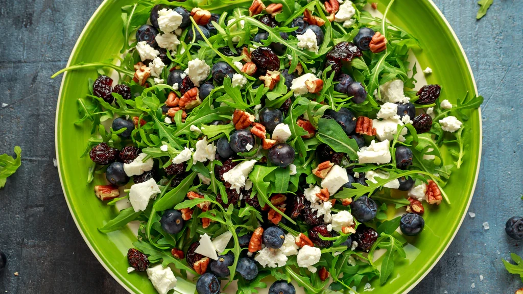Image of Blueberry-Cranberry Arugula Salad with Cinnamon Vinaigrette