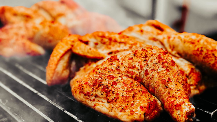 Image of Place on the grill and cook until the chicken reaches an internal temperature of 165ºF. This should take about 45 minutes, if not longer.