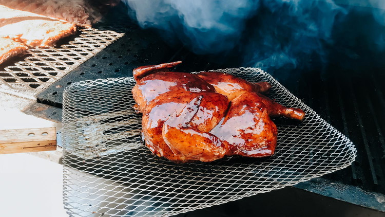 Image of Return to the grill until the chicken reaches an internal temperature of 170ºF and the glaze or sauce is tacky.