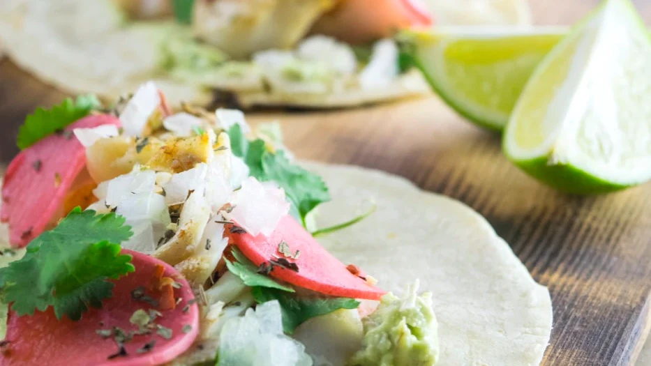Image of Mexican Spiced Fish Tacos with Pickled Radishes and Avocado Crema