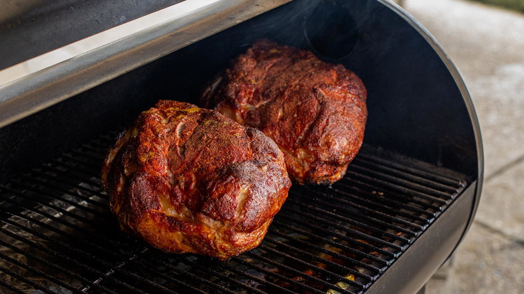 Image of We cook our pork hot and fast around here. Smoke the pork at 300ºF using one or two chunks of pecan or hickory wood for approximately 4 hours (this may vary depending on size of meat).