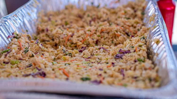 Image of While your pork cooks, prepare the slaw. In a large bowl, combine Coleslaw Mix with 1/3 cup Tennessee Red Barbecue Sauce, 1 tablespoon Sweet & Savory Seasoning, and 2 tablespoon Mayonnaise.