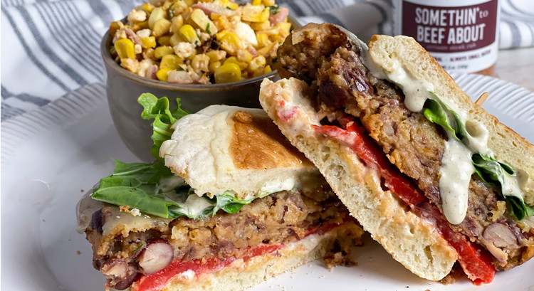 Image of In order, place the roasted red peppers, the bean patty, the greens and top it off with the English Muffin! Enjoy!